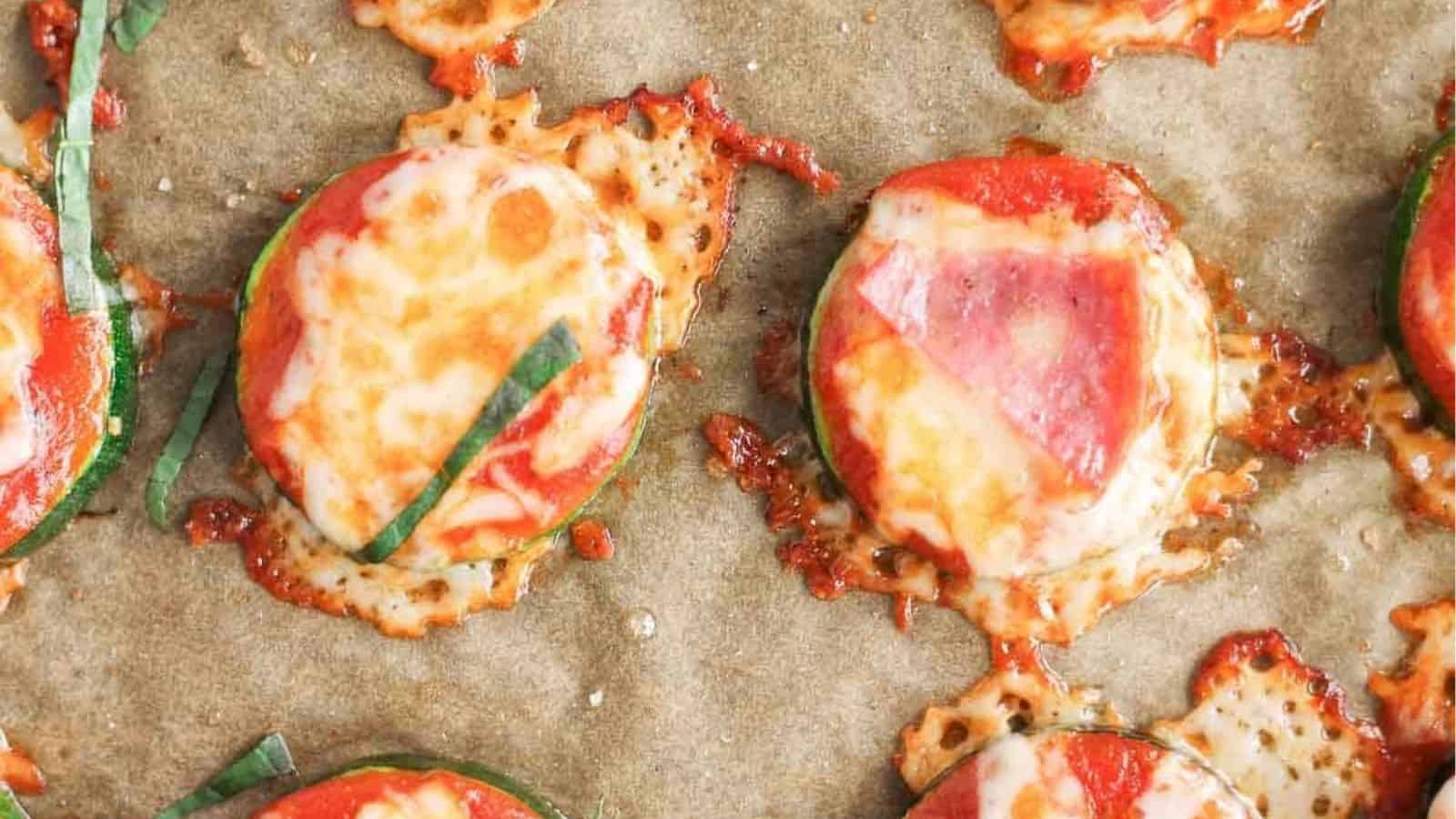 An overhead image of Zucchini Pizza Bites on a baking tray.