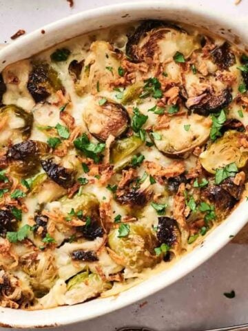 Top view of Easy Brussels Sprouts Casserole on a wooden board.