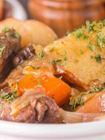 Close-up image of slow cooker beef stew in a bowl.