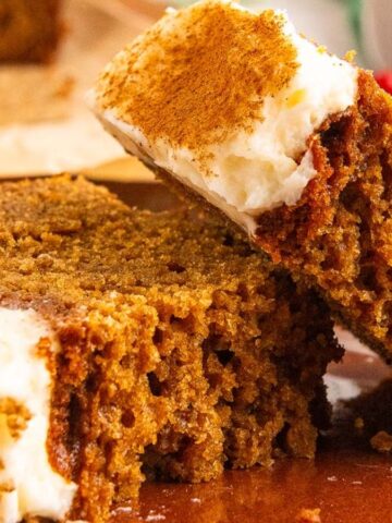 Two slices of Gingerbread Loaf on a plate.