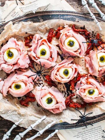A plate of Halloween Antipasto Eyeballs Appetizer.