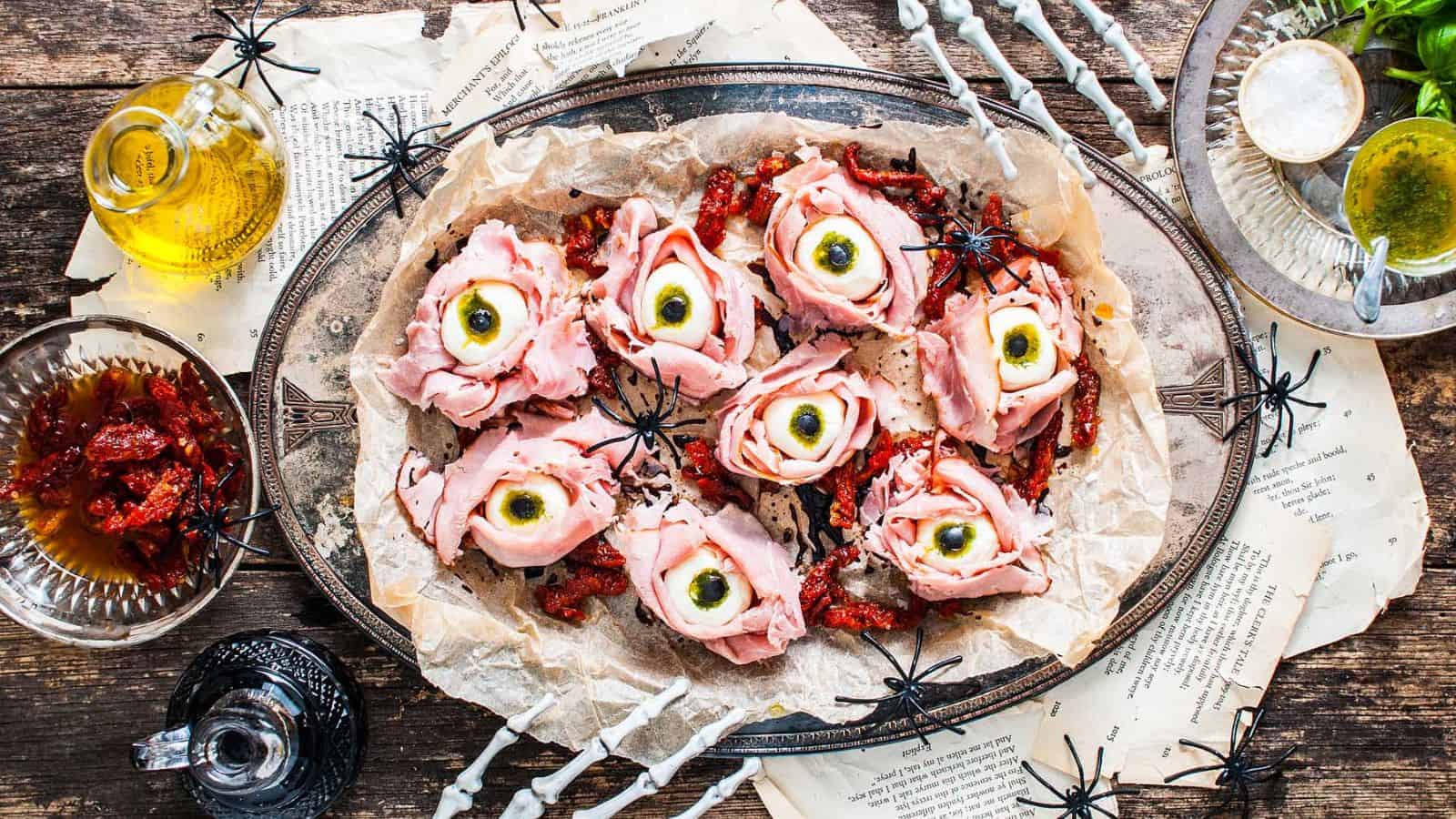 A plate of Halloween Antipasto Eyeballs Appetizer.