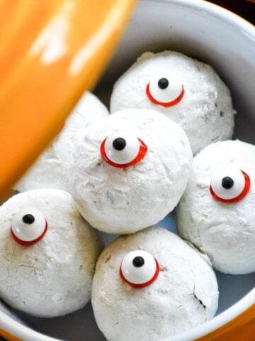 A pot filled with Halloween Doughnut Hole Eyeballs.