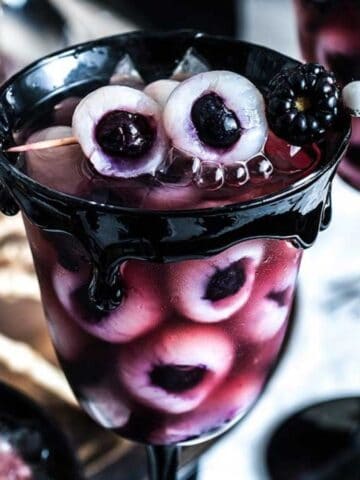 A glass of Halloween Eyeball Punch.