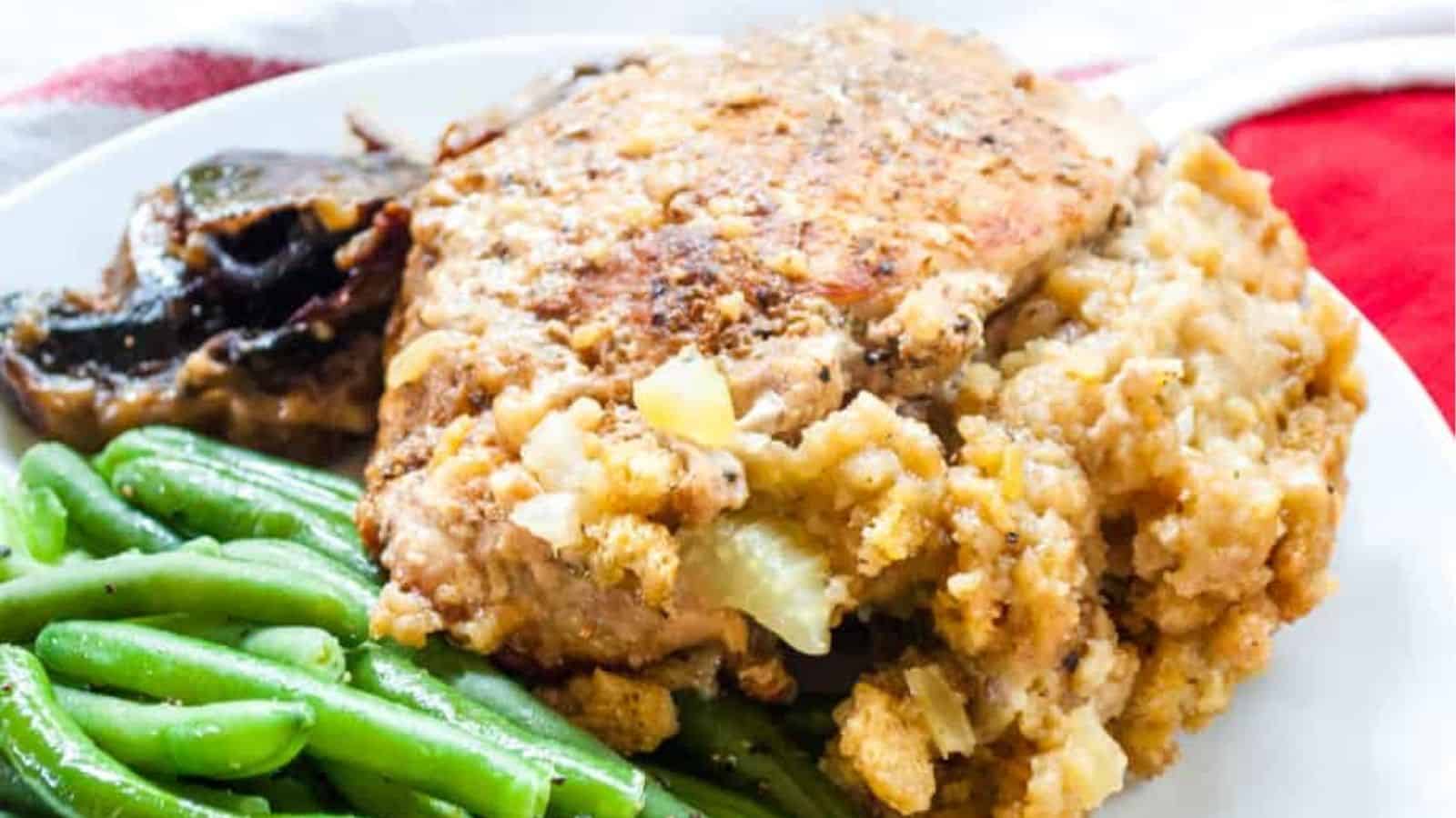Close-up image of instant pot stuffed pork chops on a plate.