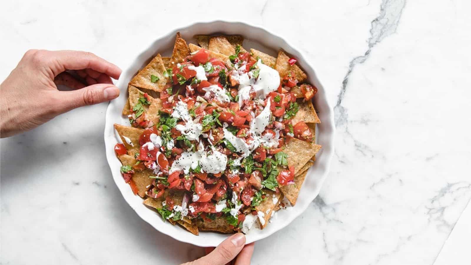Overhead image of nut-free nachos in a bowl.