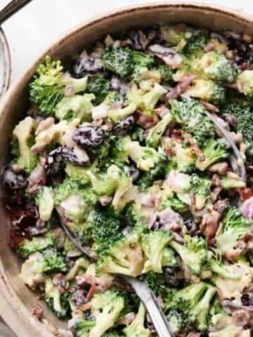 Overhead image of best broccoli salad with creamy dressin on a bowl.