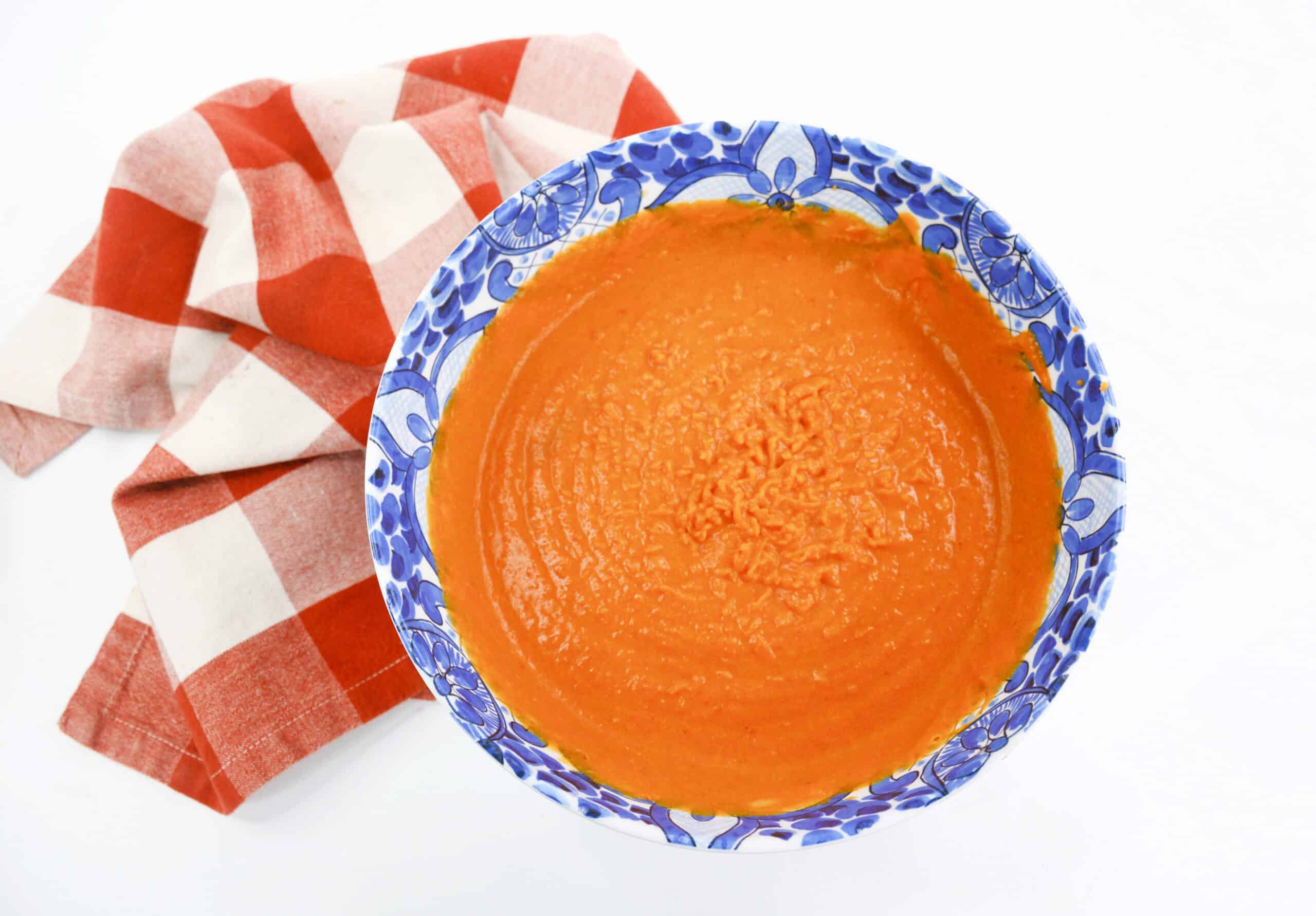 Close-up image of pumpkin blondie wet ingredients mixture in a bowl.