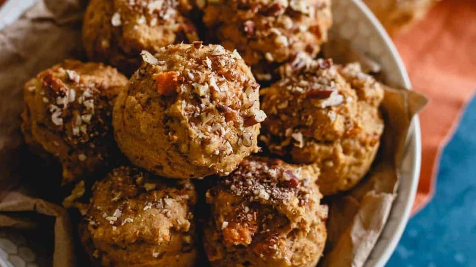 Close-up image of whole wheat sweet potato banana muffins in a bowl.