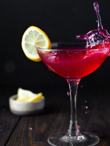 A glass of Cranberry Cosmopolitan Cocktail.