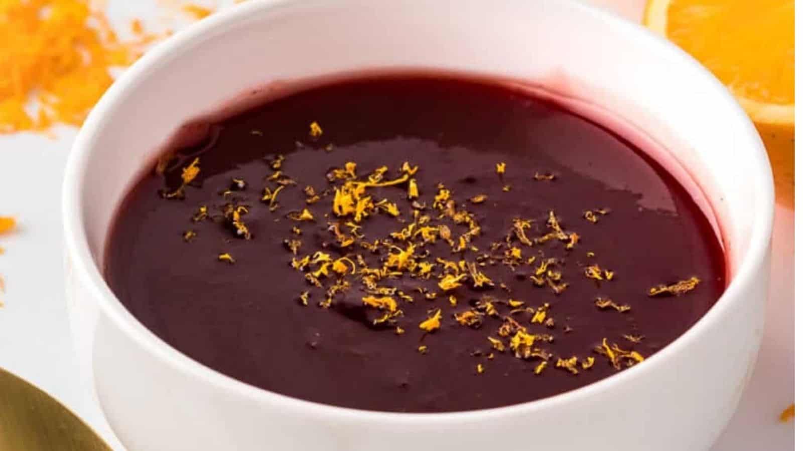 Close-up image of elevated cranberry sauce in a bowl.
