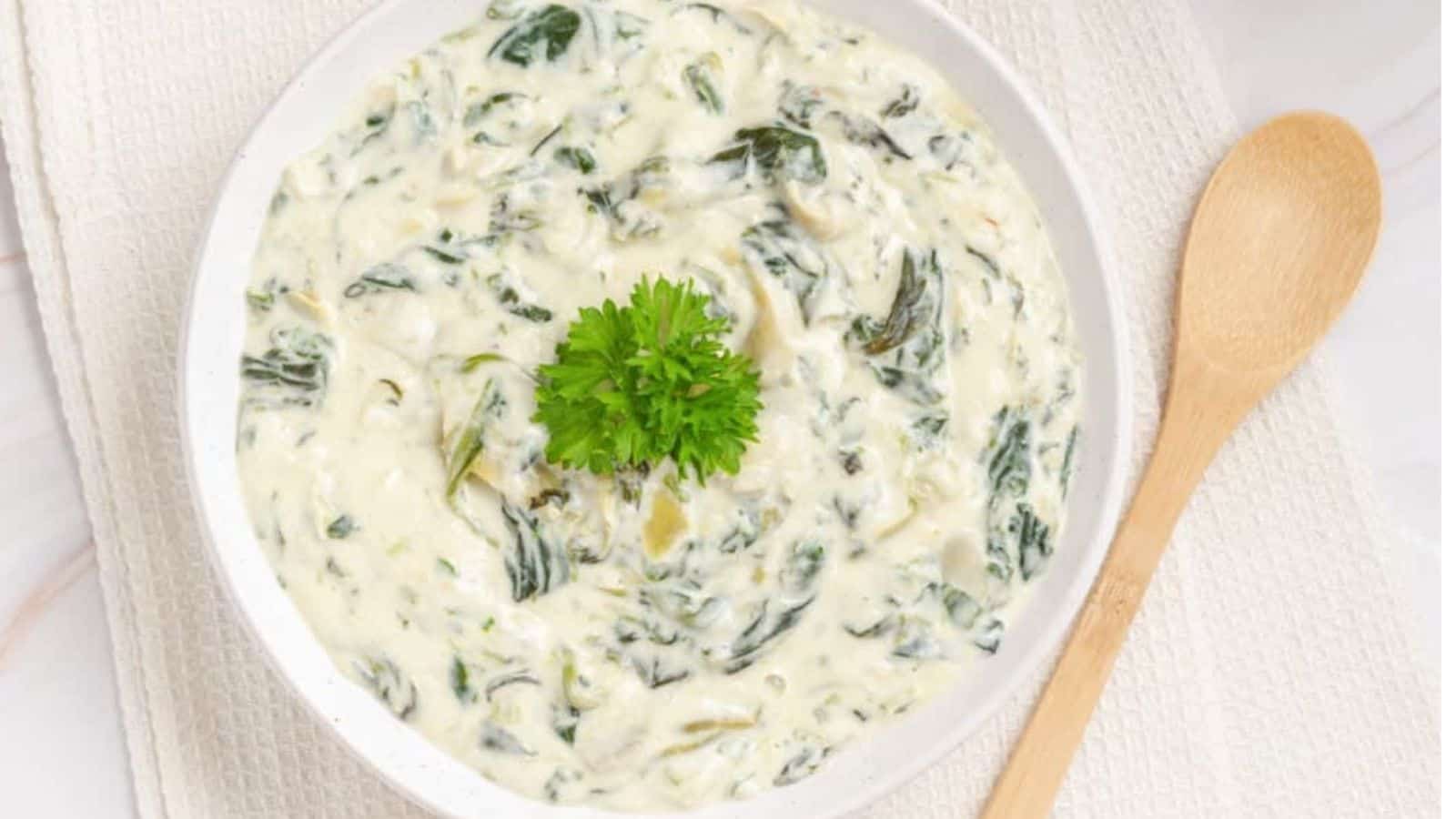 Overhead mage of instant pot spinach artichoke dip in a bowl.
