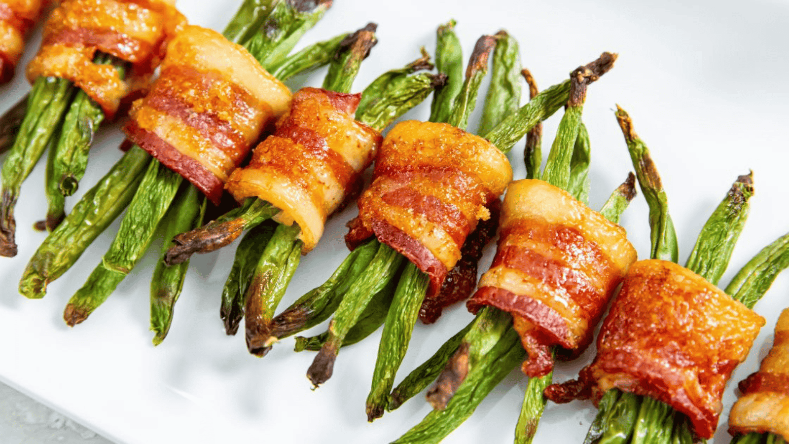 Bacon Wrapped Green Beans with Brown Sugar next to each other.