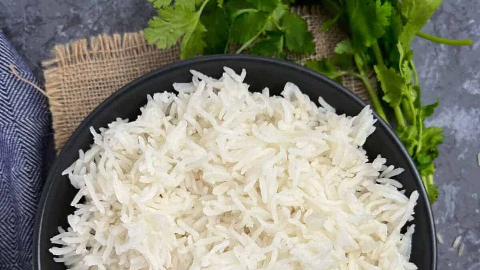 Top view of Basmati Rice on a black plate.