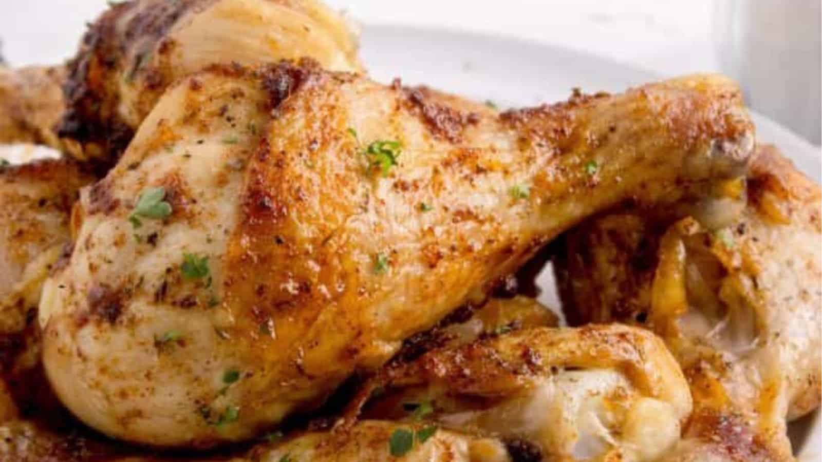 Close-up image of baked chicken legs.