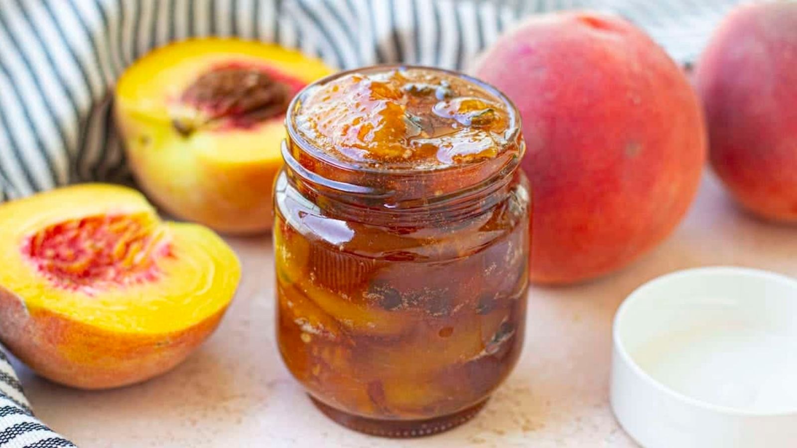Peach Jalapeno Jam in a mason jar.