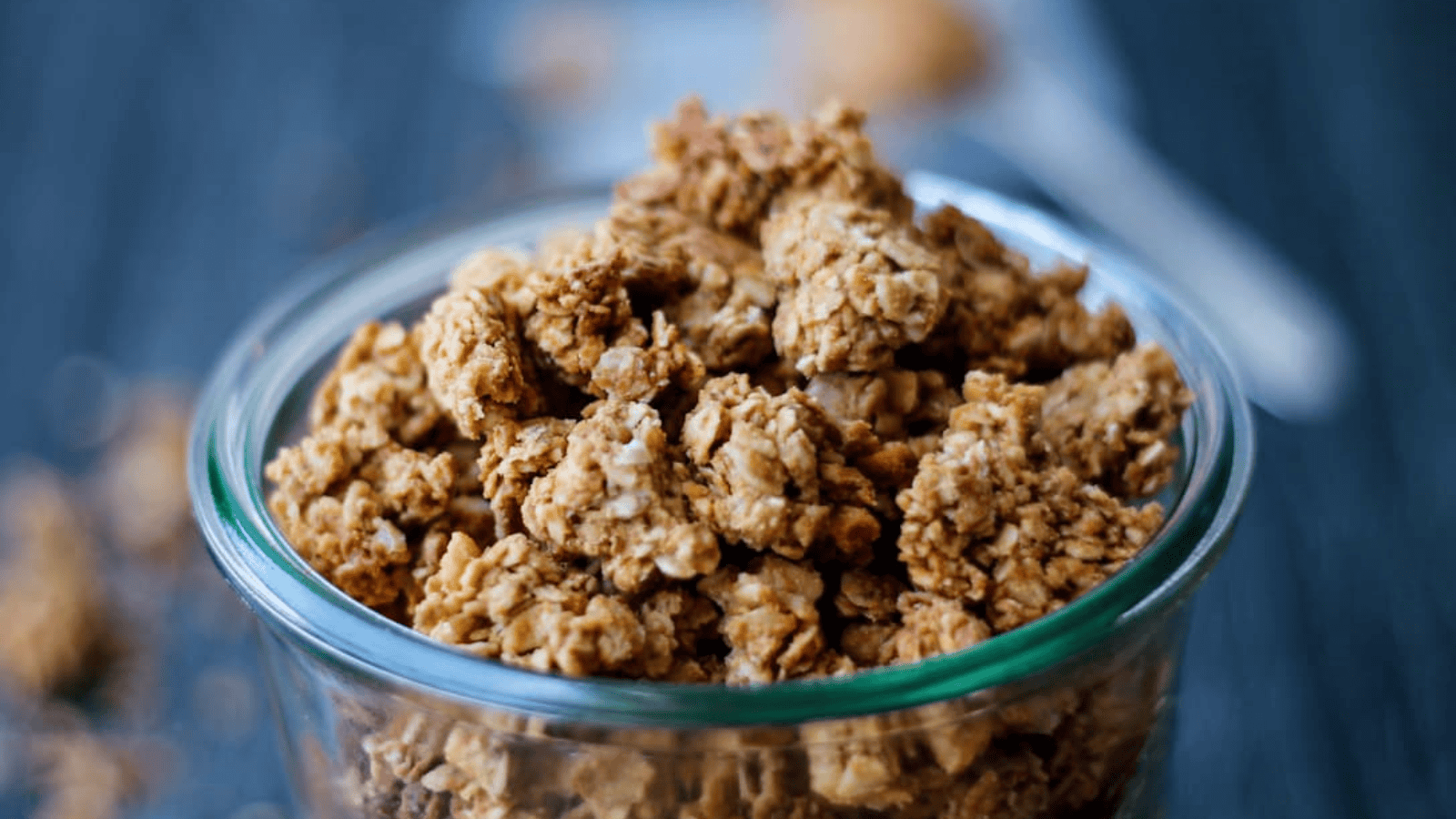 Overhead image of peanut butter granola in a jar.