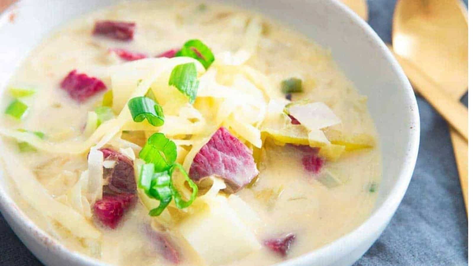 Close-up image of reuben soup in a bowl.