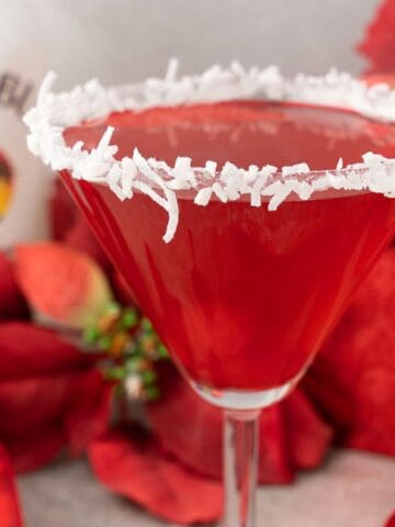 A glass of Santa’s Hat Coconut Rum Cocktail.