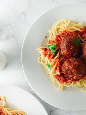 An overview of a plate of Vegan Air Fryer Meatballs with Spaghetti Marinara.
