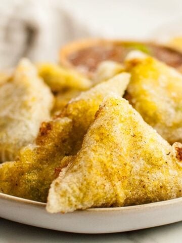 A plate of Vegan Samosas in Rice Paper.