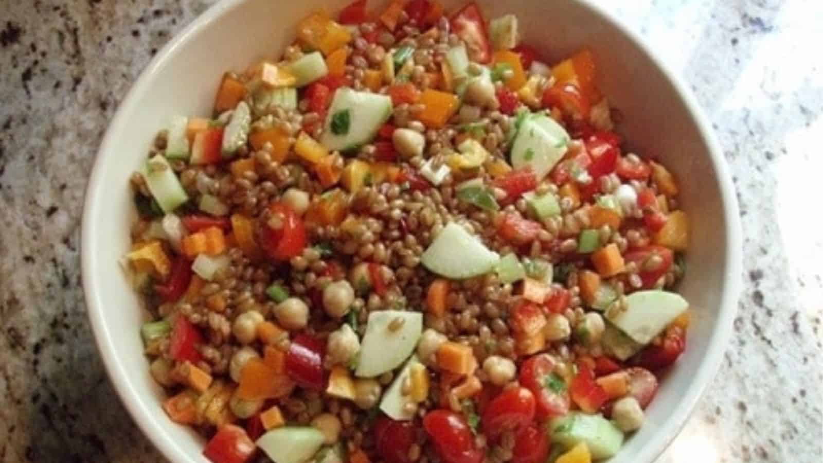 Close-up image of wheat berry salad on a bowl.