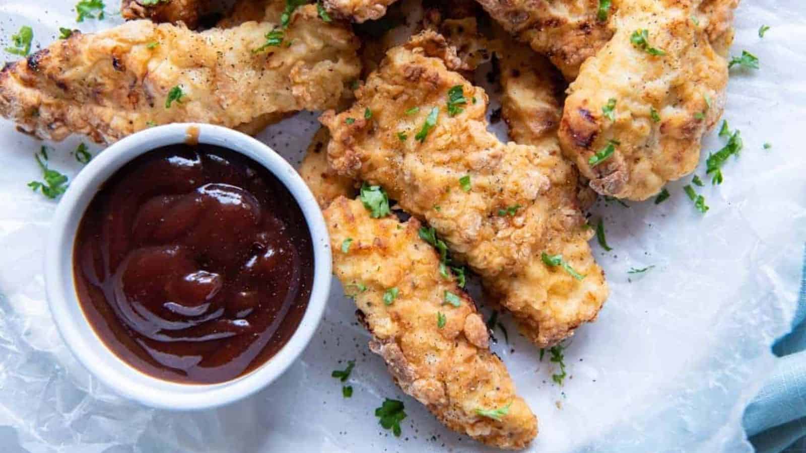 An overview of Air Fryer Chicken Tenders with Flour and a dip.