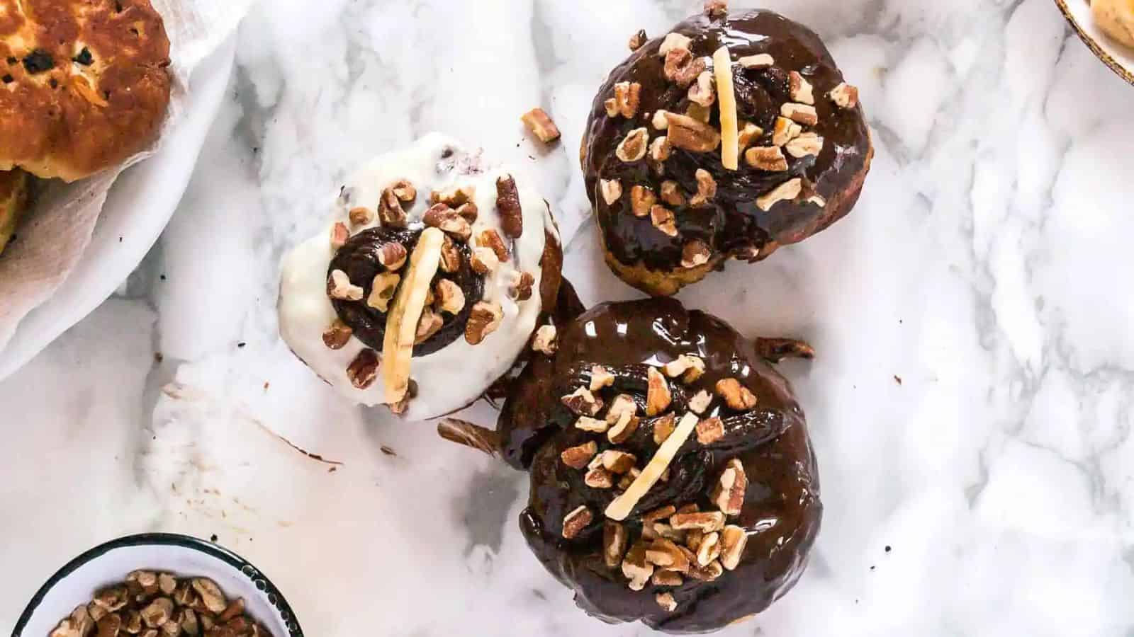 An overview of three Banana Chocolate Sufganiyot.