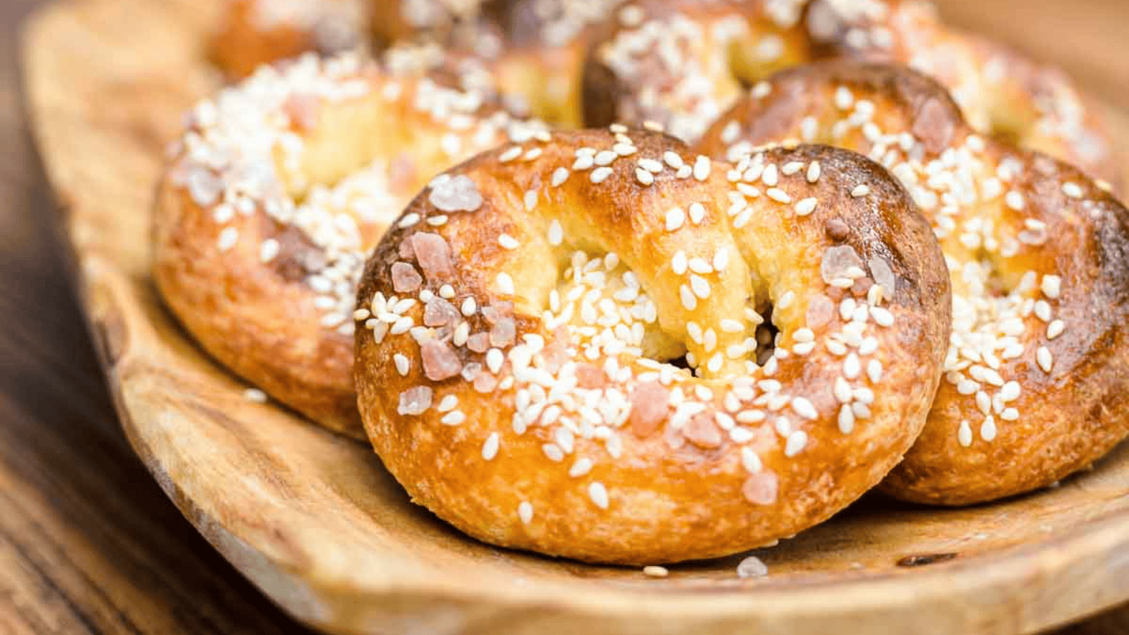 Pretzels in a basket on the grass.