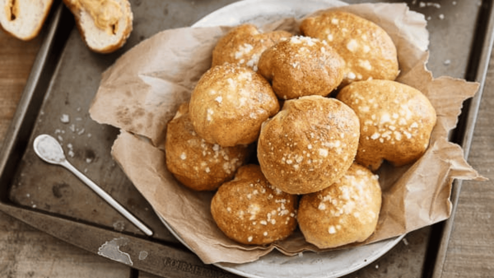 Pizza Hummus Stuffed Pretzel Bites in a bread basket.