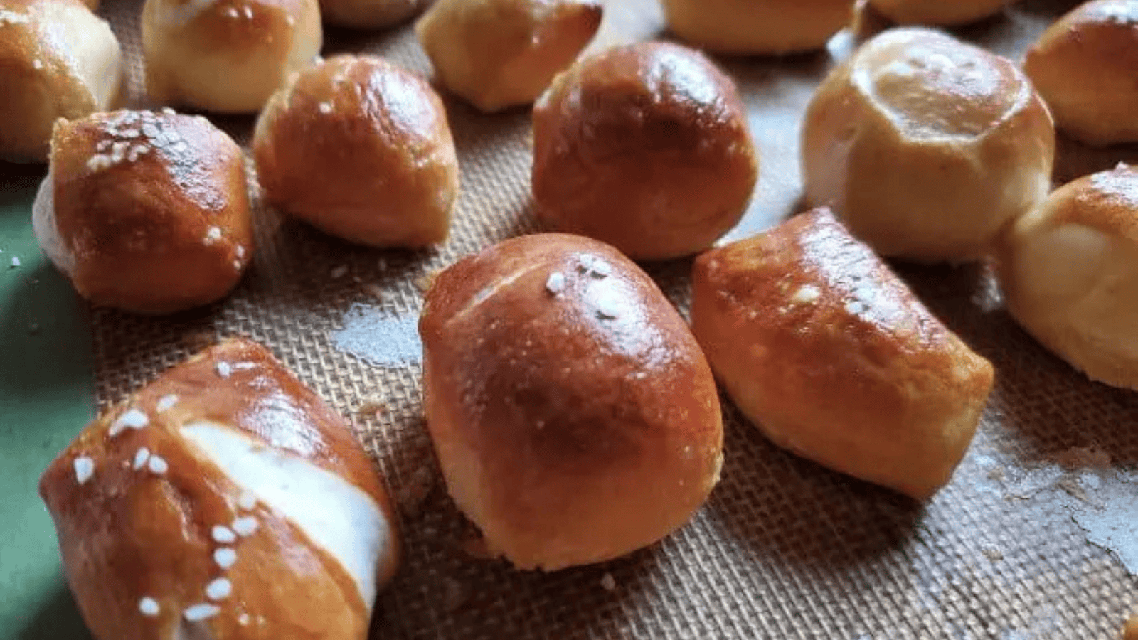 Image shows a bowl filled with homemade Pretzel Bites.