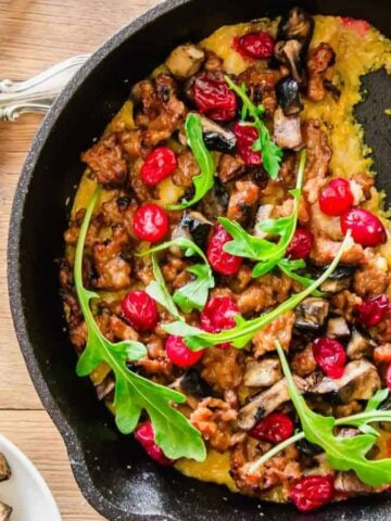 An overview of Skillet Cheddar Polenta with Sausage.