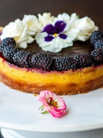 An image of Blackberry Lime Tart with Edible Flowers.