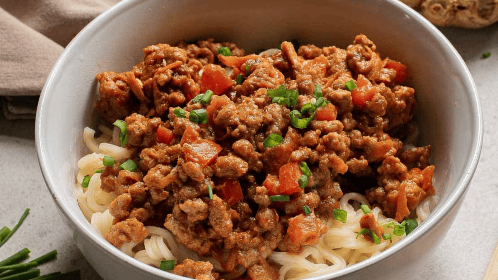 Peanut Sauce Beef and Ramen Noodles in a bowl.