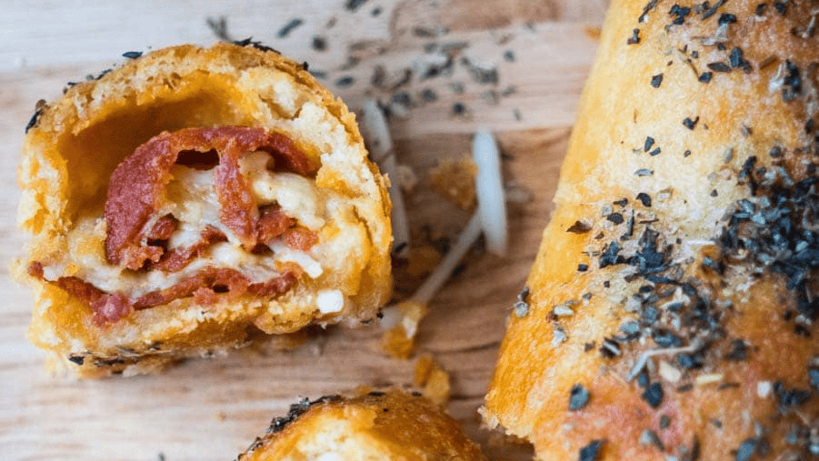 Cheesy Pepperoni Bread with Flaky Crescent Roll Crust sliced.