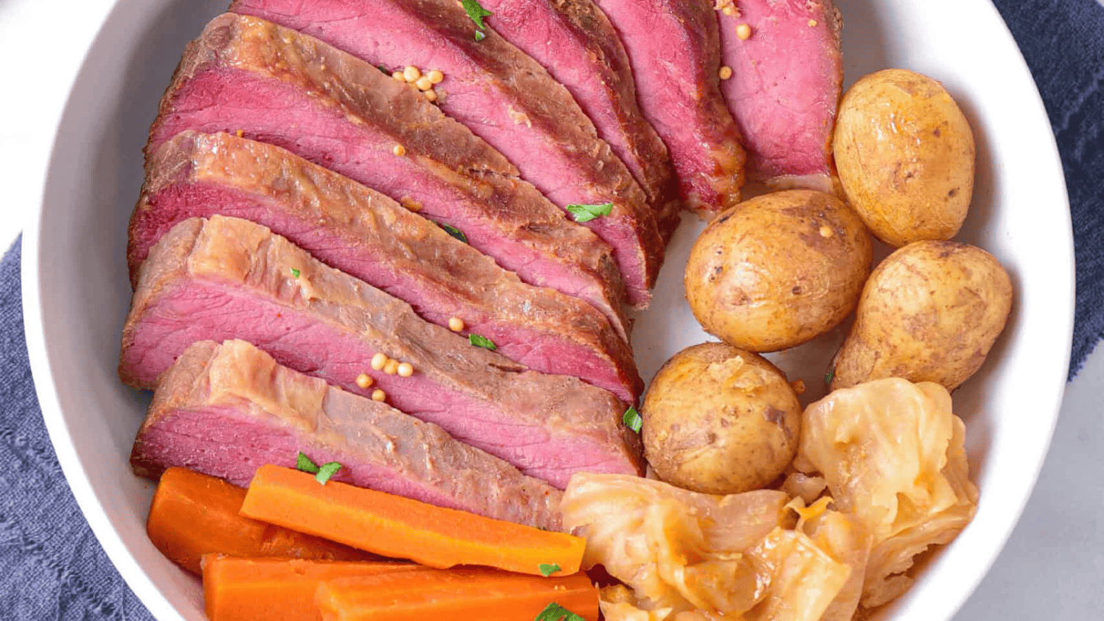 Crock Pot Corned Beef and Cabbage on a plate.