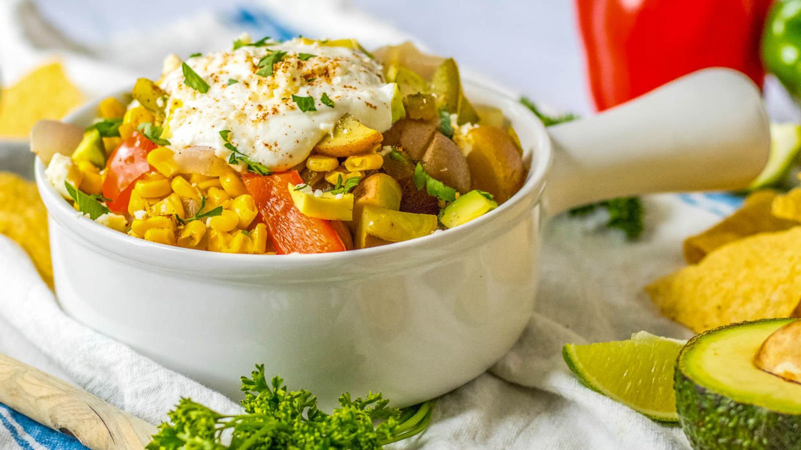 An image of Mexican Street Corn Soup with potatoes, corn and red pepper.