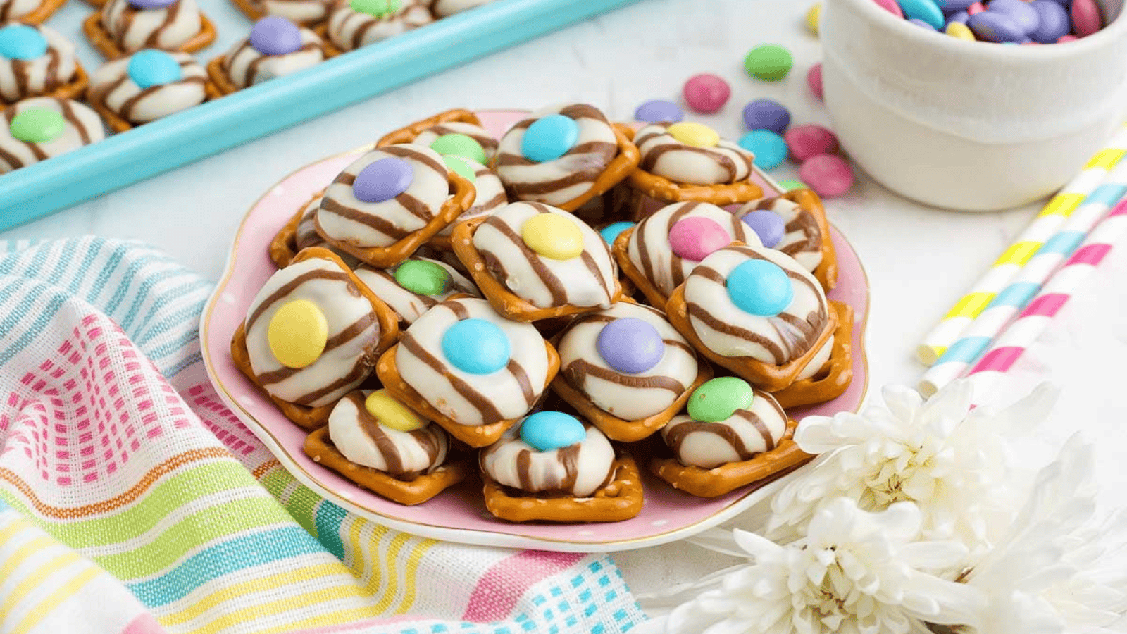 Pistachio Macarons With White Chocolate Ganache on a plate.