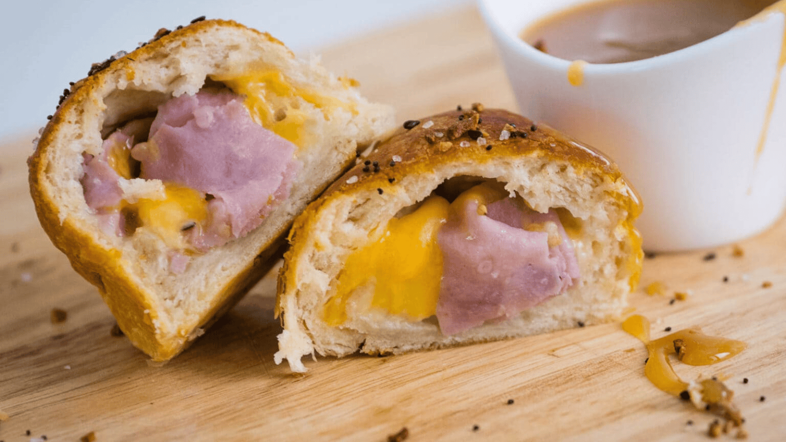 This image has an empty alt attribute; its file name is Stuffed-Ham-and-Cheese-Biscuit.png