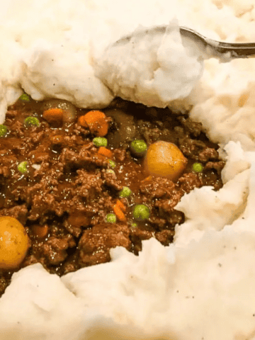 Traditional Irish Shepherd’s Pie with Guinness in a pan.