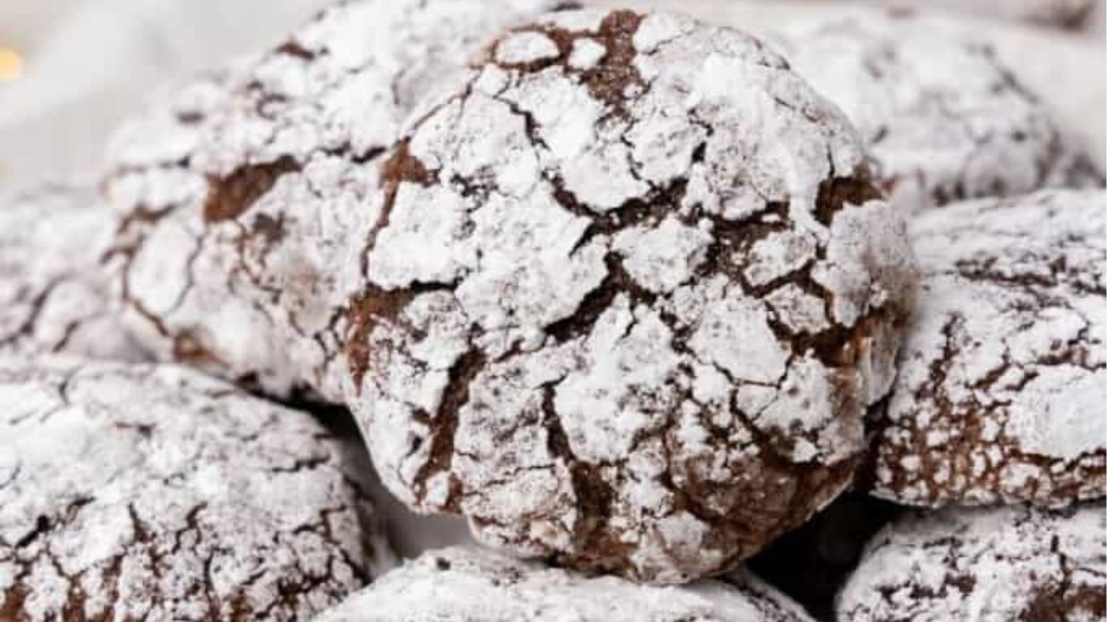 Close-up image of brownie crinkle cookies.