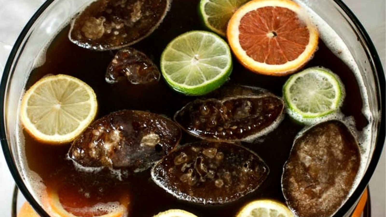 Close-up of an overhead image of coca-cola punch in a bowl.