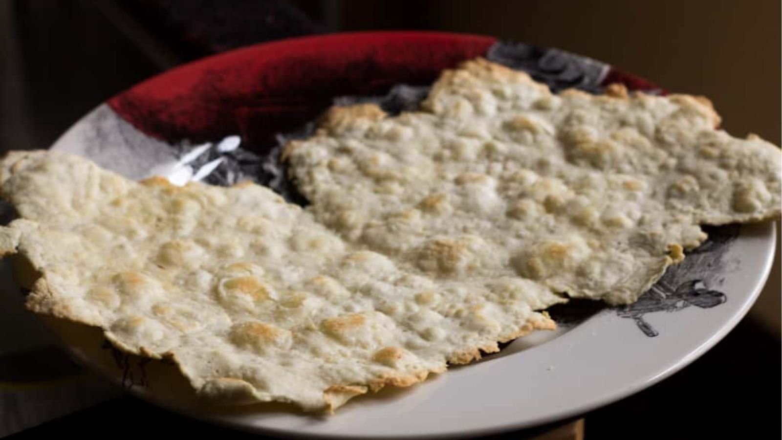 Close-up image of last minute homemade matzos on a plate.