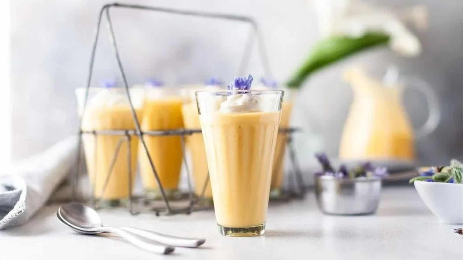 Close-up image of mango yogurt mousse pudding dessert in a glass.