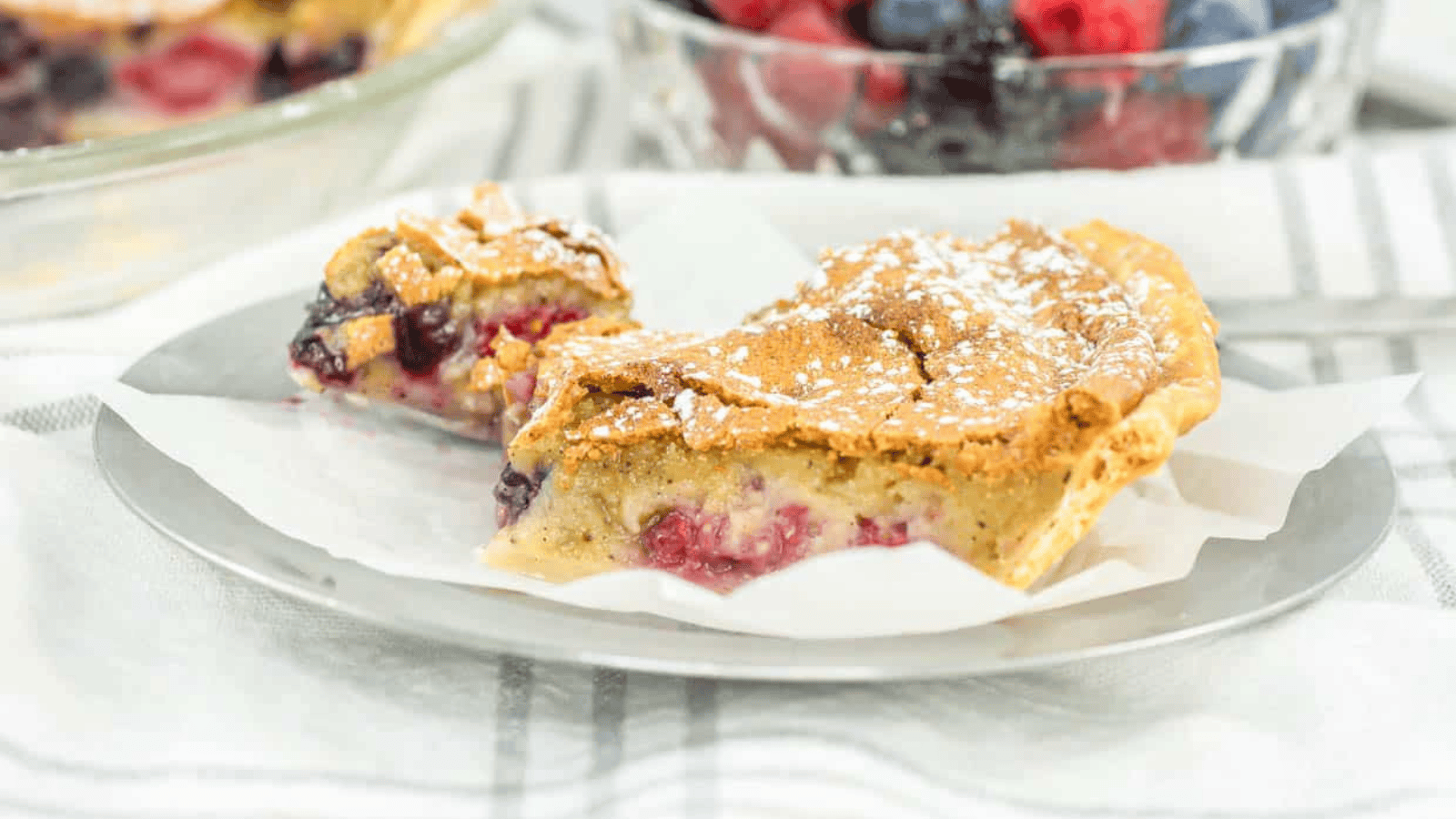 Mixed Berry Custard Pie sliced.