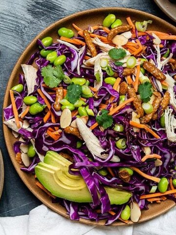An overview of plates full of Sesame Avocado Asian Chicken Salad.