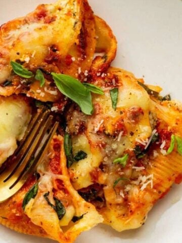 An overhead image of serving stuffed shells with ricotta.