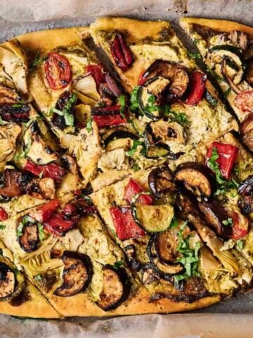 A whole Vegan Pizza on a tray.
