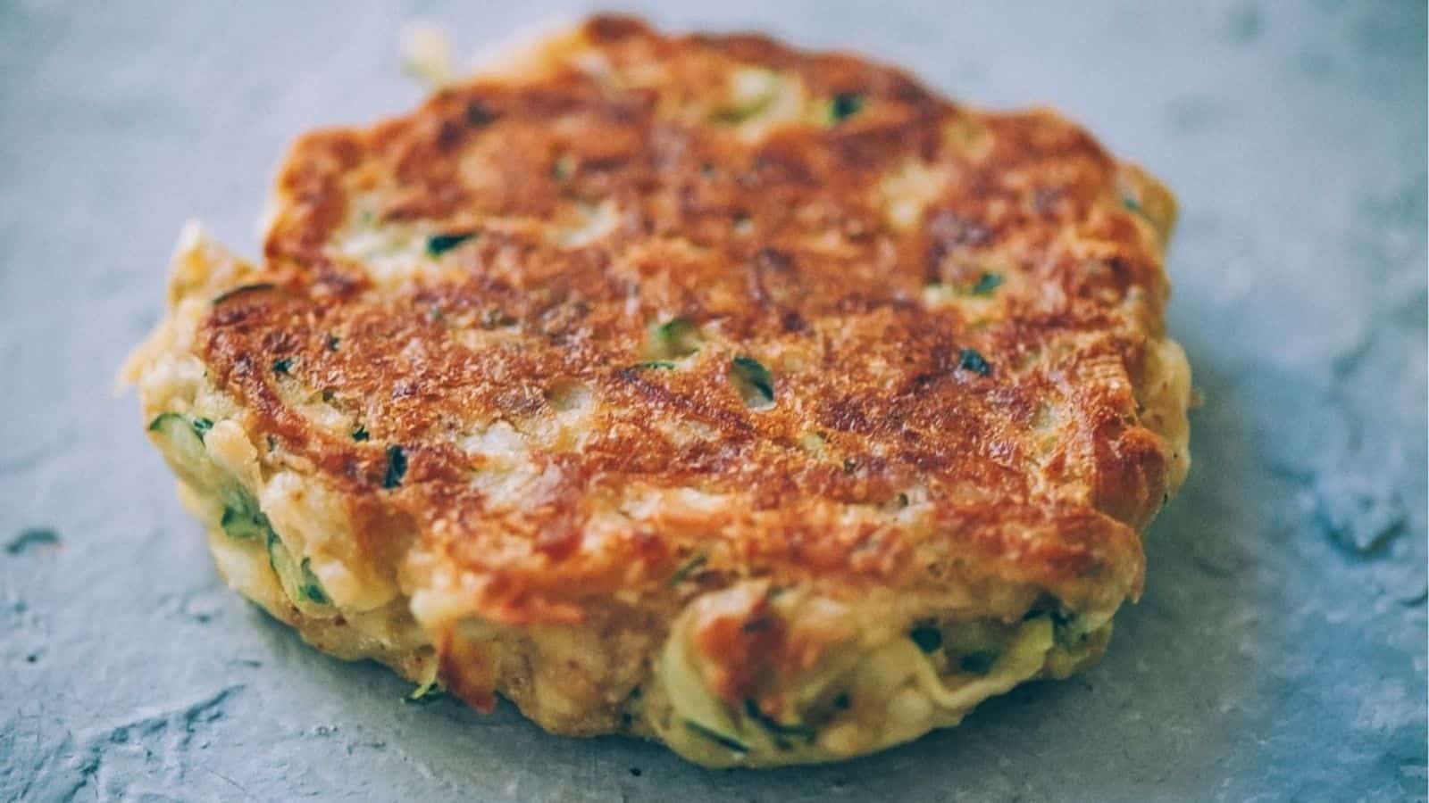 Close-up image of vegan zucchini fritter.