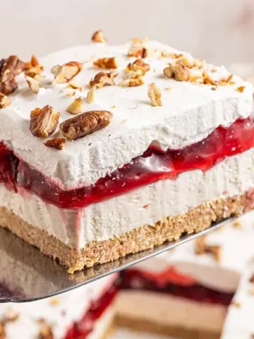 A close-up image of a slice of Cherry Lush.